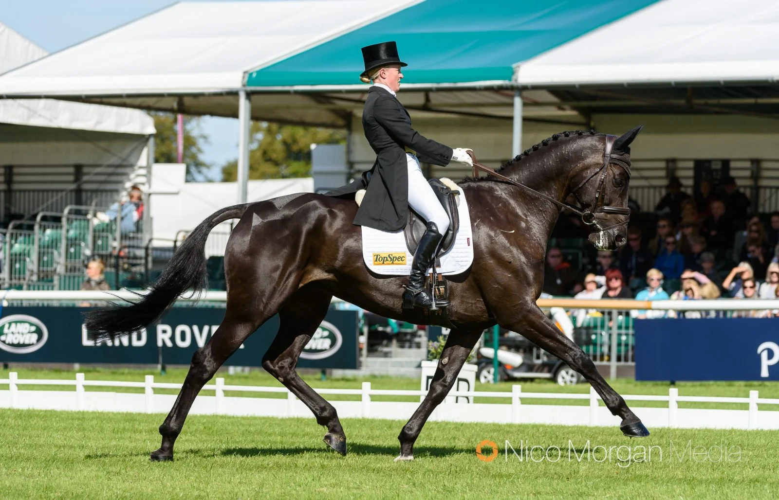 Eliza winning a trophy at Chatsworth